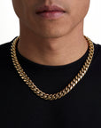 Model wearing 12mm 18K gold plain cuban chain set by Iceman Society, side view