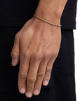 Model wearing 3mm 18k gold rope chain set by Iceman Society, side view