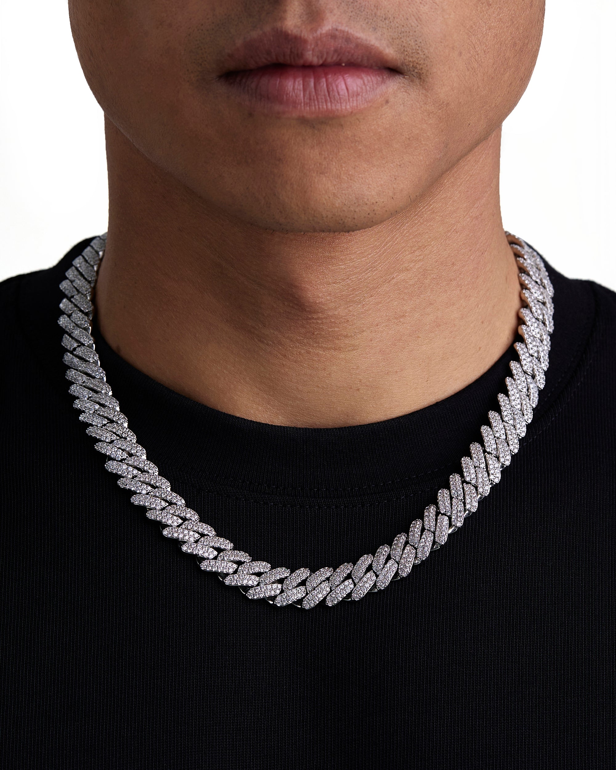 Model wearing 13mm white gold ice prong cuban necklace by Iceman Society, front view