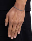 Model wearing 3mm white gold plain cuban chain set by Iceman Society, side view