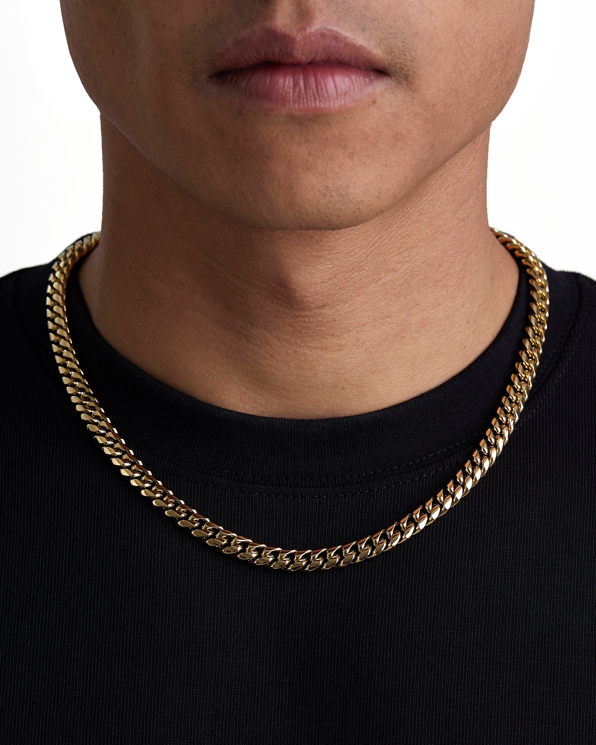 Model wearing 8mm 18K gold plain cuban chain set by Iceman Society, front view