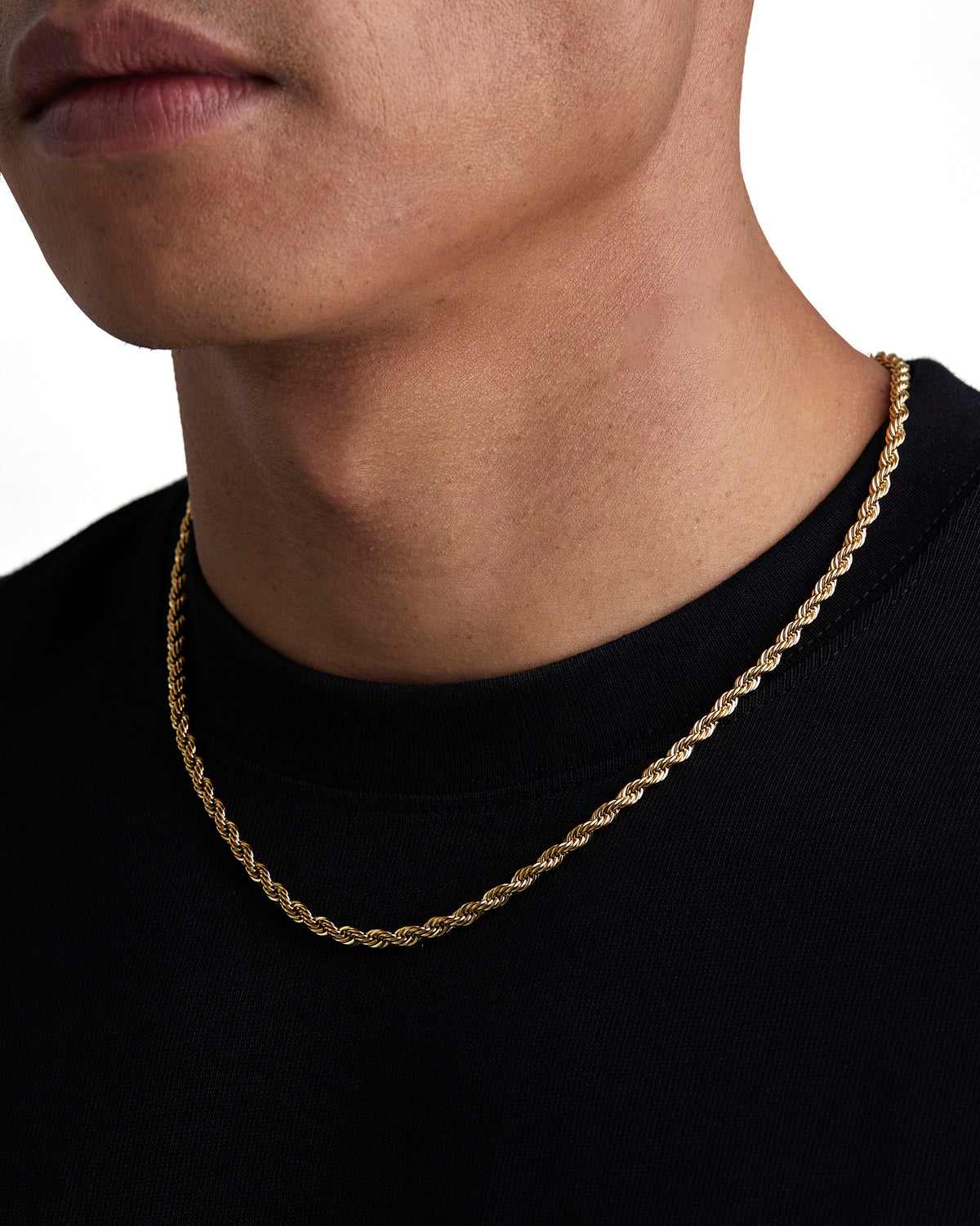 Model wearing 4mm 18k gold rope necklace by Iceman Society, side view